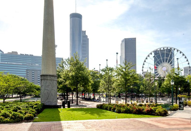 Daytime shot of downtown Atlanta’s Centennial Olympic Park with the SkyView Ferris wheel in the background.