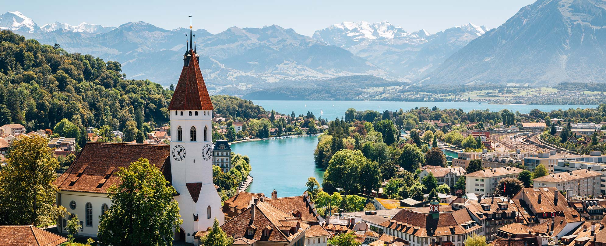 Panoramic view from the Swiss Alps of a town and river in Bern, Switzerland.
