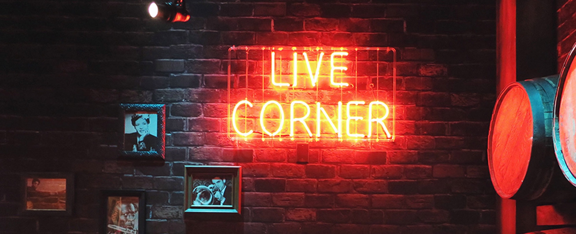 A neon sign that says Live Corner at a bar in Nashville, Tennessee